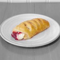 Strawberry and Cream Cheese Croissant ·  Flaky French pastry with strawberries and cream cheese.