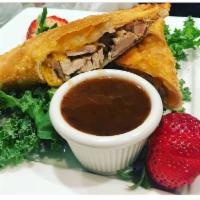 Jerk Chicken Empanada · freshly made to order, with the most succulent and flavorful jerk chicken.