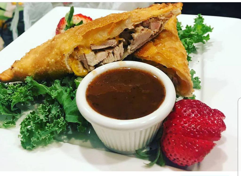 Jerk Chicken Empanada · freshly made to order, with the most succulent and flavorful jerk chicken.