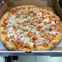 Bruschetta Pizza · Fresh diced tomato, basil and extra virgin olive oil.