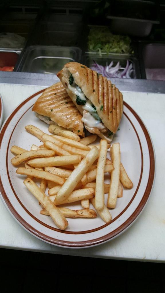 Chicken Pesto Panini · Roasted peppers and fresh mozzarella. Includes fries. Made on homemade focaccia bread.