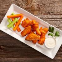Chicken Wings · One pound of bone-in wings, tossed with Buffalo, BBQ, or Jamaican Jerk (dry rub) sauce, serv...