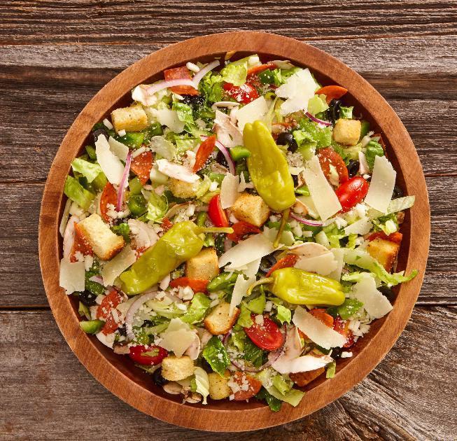 Kitchen Sink Salad · Mushrooms, bell pepper, black olive, tomato, pepperoni, onion, pepperoncini, Parmesan, mozzarella, croutons, iceberg lettuce, Zaffiro’s Italian dressing.