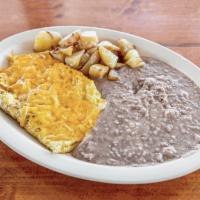 Omelet Plate · Covered with cheese served with refried beans and potato.