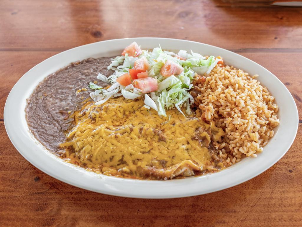 2. Enchiladas Plate · 3 enchiladas choice of beef, cheese, or chicken topped with gravy sauce and melted cheese, served with beans, rice, salad and two tortillas FREE SOPAPILLA
