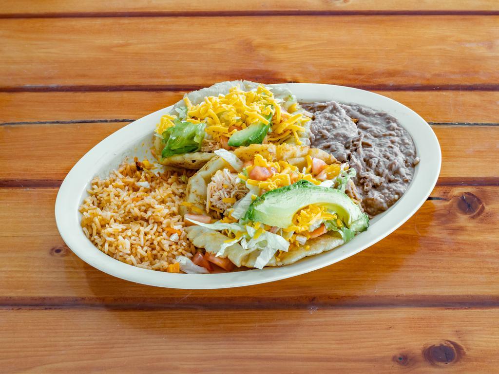 3. Puffy Taco Plate · 2 corn puffy tacos, your choice of beef or chicken with lettuce, tomato, and avocado served with beans and rice. FREE SOPAPILLA