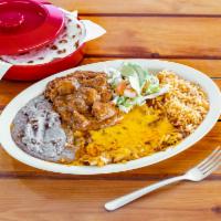 8. Texas Plate · 2 cheese enchiladas, carne guisada, beans, rice, salad, tomato, avocado and two tortillas of...