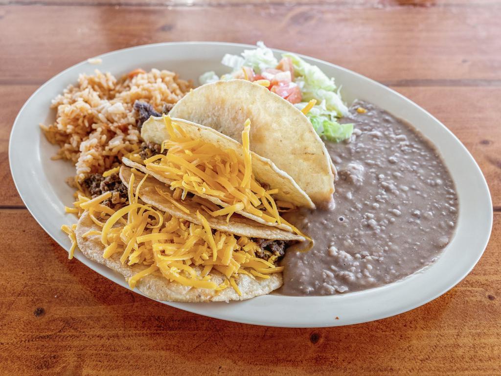 9. Soft Tacos Plate · 3 beef or chicken tacos covered with ranchera sauce, with rice, beans, and salad. FREE SOPAPILLA
