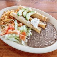 13. Flautas Plate · 3 fresh fried flautas chicken, served with beans, rice, salad, tomato, sour cream, and avoca...
