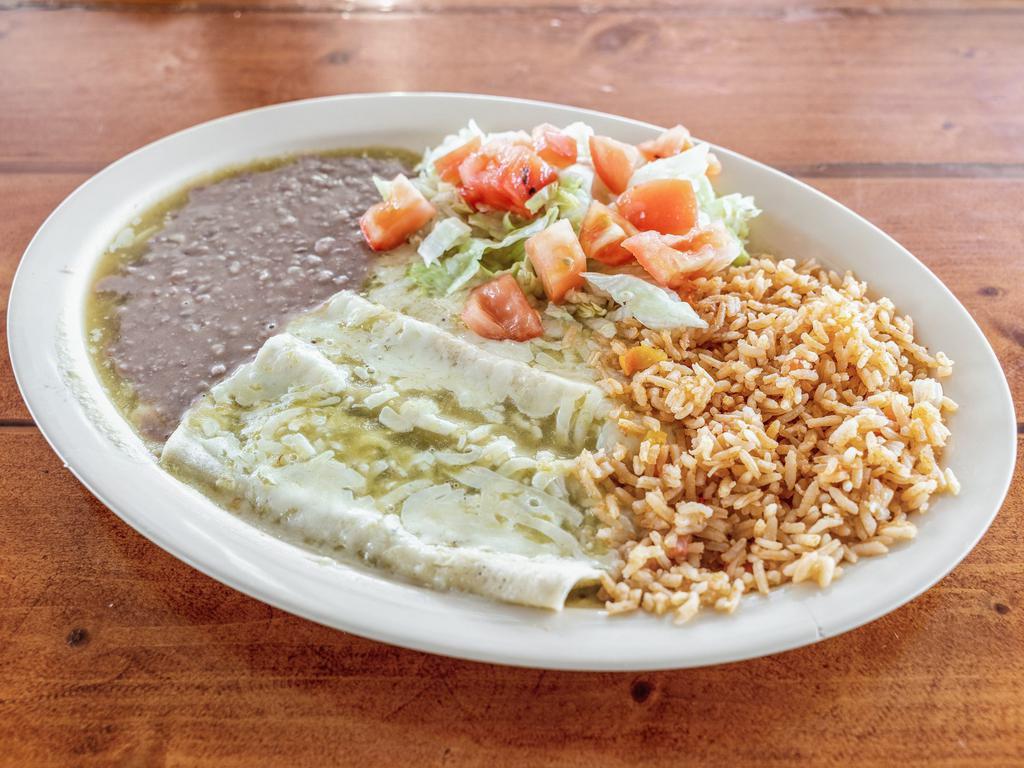  14. Enchiladas Verdes Plate · 3 enchiladas topped with tomatillo saused and melted Monterrey cheese  served , rice, beans, salad and two tortillas of your choice. FREE SO[PAPILLA