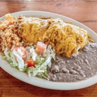 18. Burrito Jalisco Plate · Flour tortilla filled with beans, choice of beef or chicken wrapped and topped with gravy an...