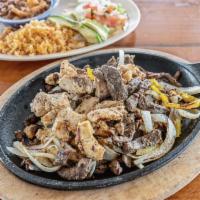 21. Parrillada Mix Plate · Beef, chicken, and shrimp mix and sauteed with peppers, onions, and tomatoes served with cha...
