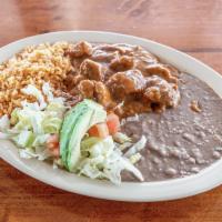 28. Carne Guisada Plate · Beef stew served with beans, rice salad, tomato, avocado, and two tortillas. FREE SOPAPILLA