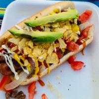 Antojitos Taco-Dog Combo · All time favorite Hotdog! An original Antojitos Hotdog made with wrapped-bacon sausage, Bist...
