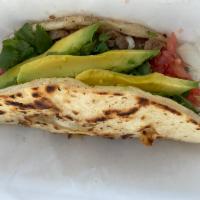 1 Quesadilla · One delicious quesadilla prepared with meat, tomatoes, grilled and raw onions, cilantro, top...