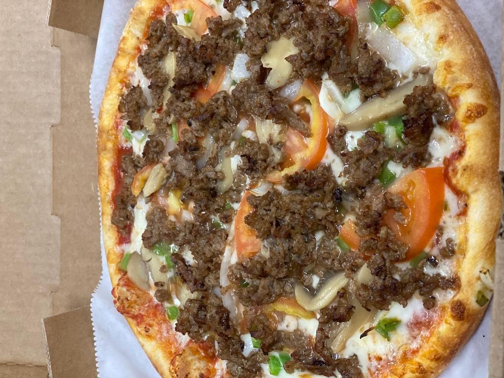 Super Philly Pizza · Steak or marinated chicken, onion, tomato, green pepper,
marinated mushrooms and mozzarella cheese.