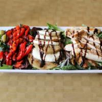 Scotto Salad · Spring mix lettuce with grilled eggplant, roasted peppers, fresh mozzarella cheese with gril...