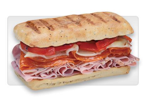 Sicilian Sub · Slow-cured ham, prosciuttini, pepperoni, provolone with roasted red peppers and creamy Italian dressing.