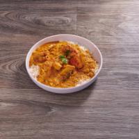 Chicken Curry a la Carte · Chicken cooked in mild sauce. Served with rice and naan.