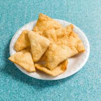 15. Cheese Wonton · 10 pieces. Come with sweet and sour sauce.