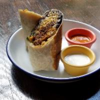 Tio's Burrito · flour tortilla, black beans, white rice, lettuce, pico de gallo, queso fresco, chile de árbo...