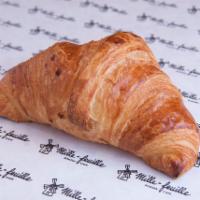 Flaky Croissant · Made with locally sourced flour and hormone free butter.