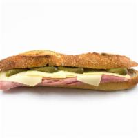 Le Parisien Sandwich · Authentic all natural French ham, baguette, European style butter, Swiss cheese and cornicho...
