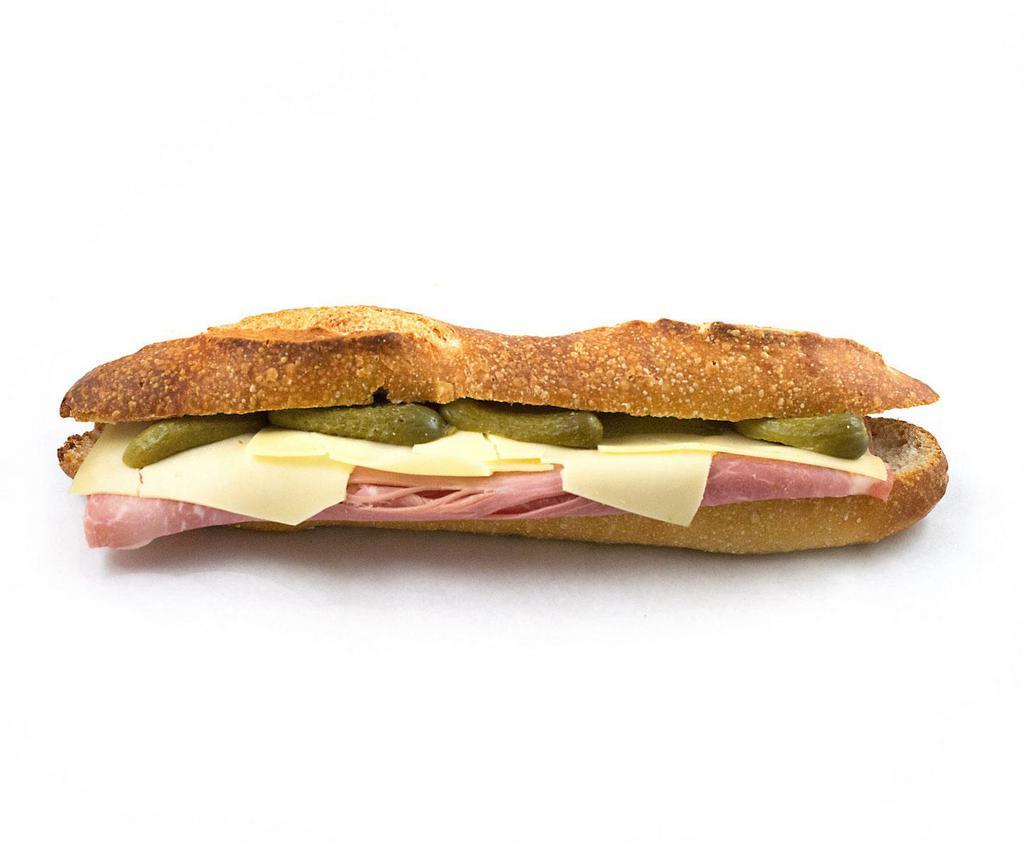 Le Parisien Sandwich · Authentic all natural French ham, baguette, European style butter, Swiss cheese and cornichons.
