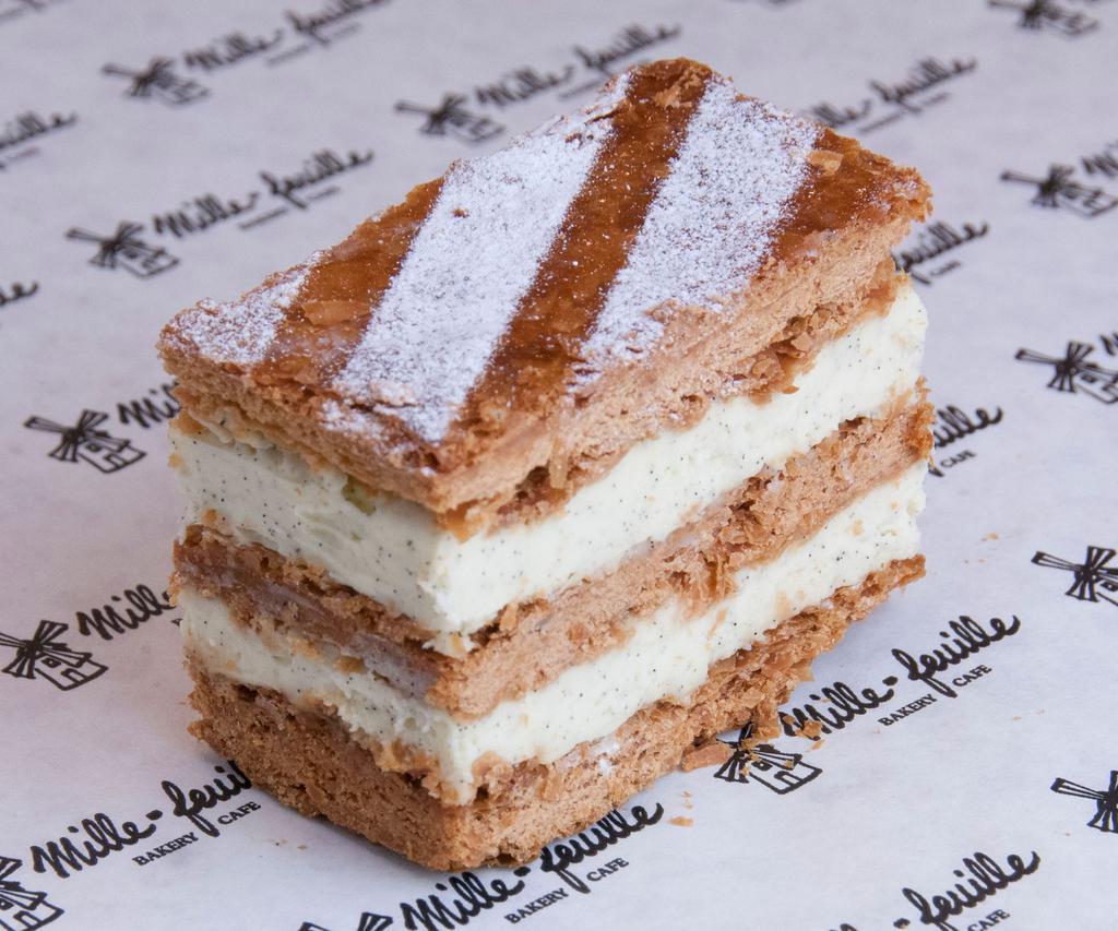 Mille-feuille · 3 layers of puff pastry and 2 layers of vanilla pastry cream creating a torrent of smoothness.