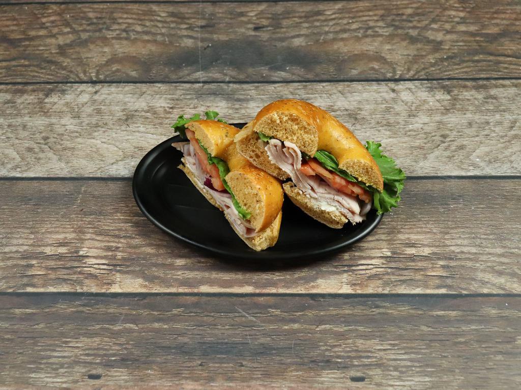 Turkey Sandwich · Includes lettuce, tomato, onion, mayo and mustard. Served on choice of bagel.
