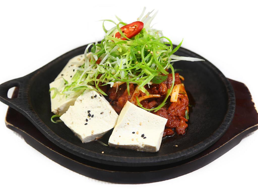 Spicy Pork Belly · Sweet and spicy marinated pork belly with tofu.
