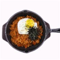 Kimchi Fried Rice · Stir fried kimchi and ham. Rice topped with a fried egg.
