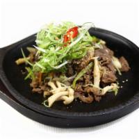 Bulgogi · Grilled marinated beef with scallion, onion and pepper.