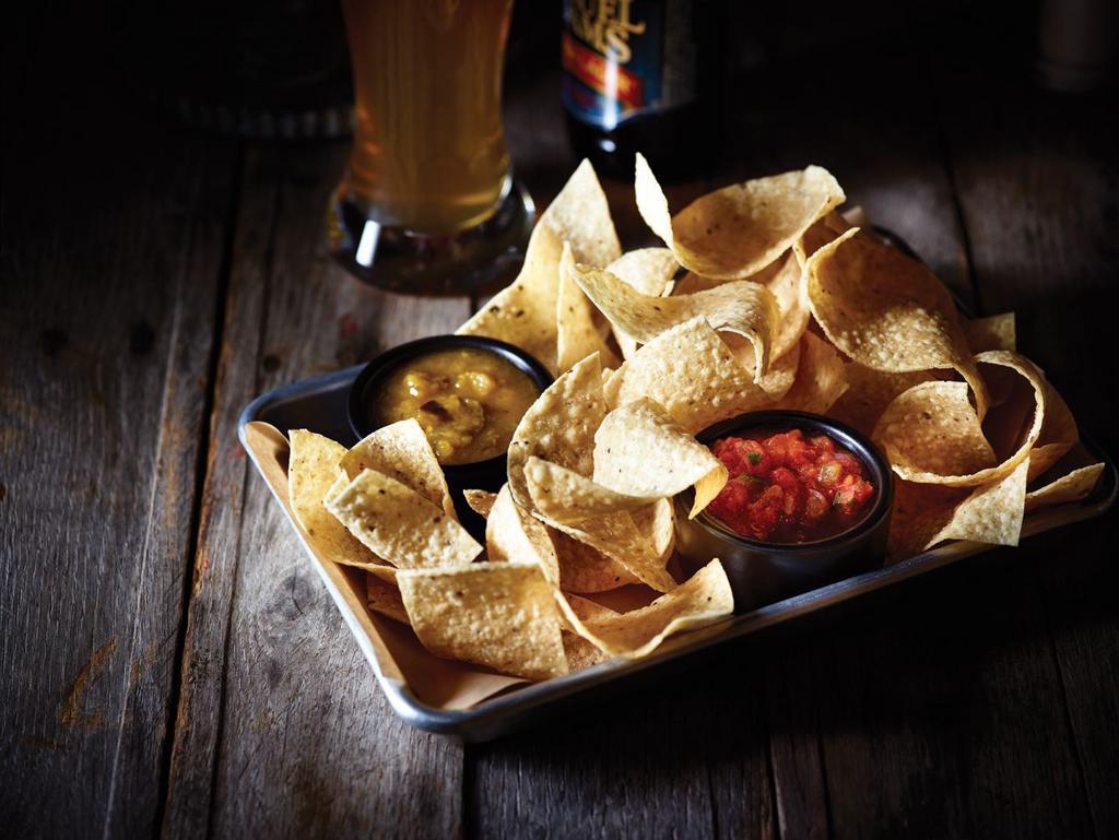 Chips & Salsa · Freshly made white corn tortilla chips and our chipotle lime salsa.