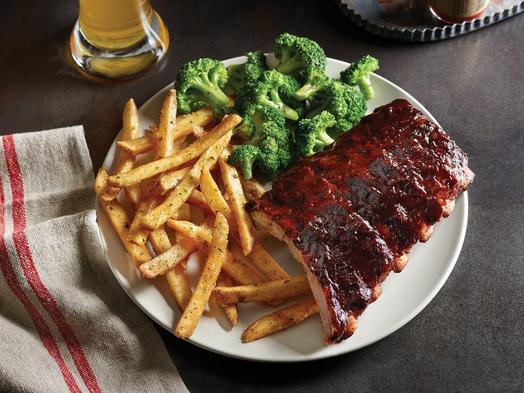Half Rack of Double-Glazed Baby Back Ribs · Slow-cooked to fall-off-the-bone tenderness. Slathered with sauce. Served with 2 sides.