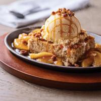 Sizzlin' Caramel Apple Blondie  · Cinnamon apples surround our famous butter pecan blondie topped with vanilla ice cream, sizz...
