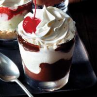 Hot Fudge Sundae Dessert Shooter  · Hot fudge drizzled over vanilla ice cream, topped with whipped cream and a maraschino cherry.