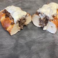 Double Stuffed Cheesesteaks · Fresh Baked Large braided pretzel, stuffed with our great tasting cheesesteak