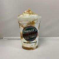 Gold Rush Sundae · Vanilla ice cream, Caramel Syrup, Vanilla Crunchies, tops with whipped cream