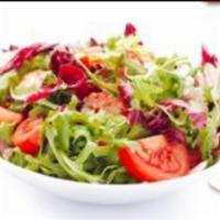 Tossed Salad · Crisp lettuce, tomato, cucumbers, scallions, radish, hard-boiled egg, olives, onions and cho...