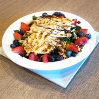 Nut and Berry Salad with Grilled Chicken · Mesclun greens, fresh strawberries, fresh blueberries, walnuts and pine nuts with light rasp...