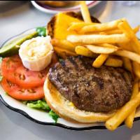 Cheese Burger Deluxe · Covered with melted cheese. Served with french fries, crisp lettuce and red ripe tomato.