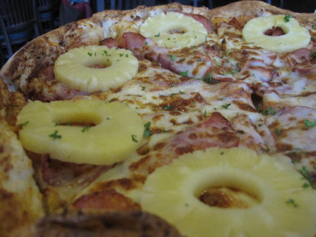 Don Ho Pizza · Canadian bacon & juicy, all-natural pineapple rings on a sea of cheese.