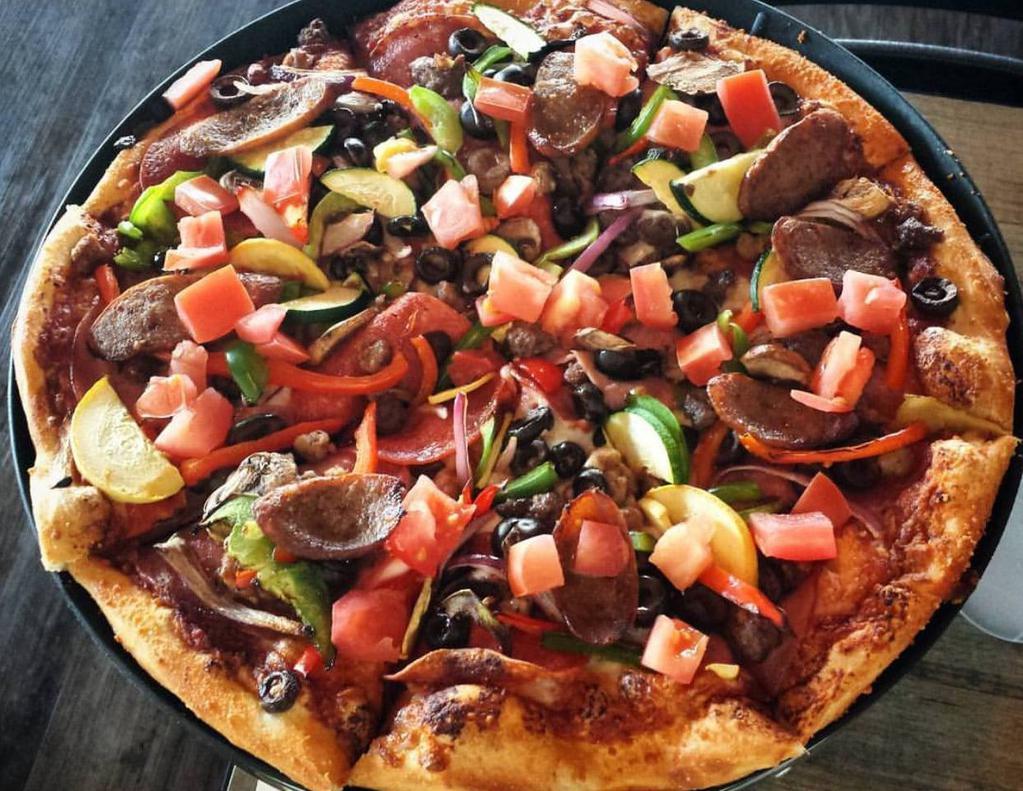 The Sink Pizza · Genoa salami, spicy Italian link sausage, Canadian bacon, pepperoni, ground beef, crumbled Italian sausage, mushrooms, red onions, red peppers, green peppers, zucchini, yellow squash, black olives & chopped tomatoes.