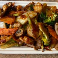 126. Four Seasons · A delicious blend of beef, chicken, pork and jumbo shrimp sauteed with a variety of Chinese ...