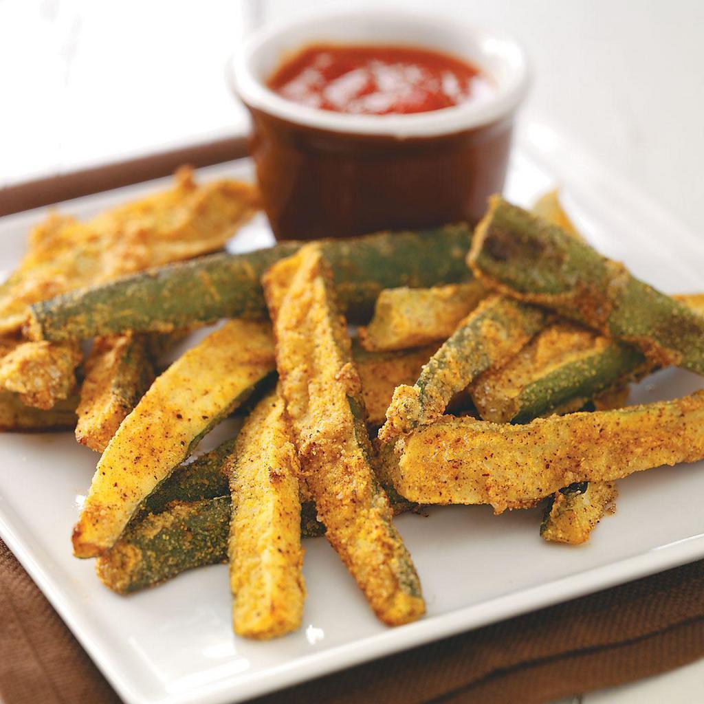 Fried Zucchini Sticks · Coated in seasoned bread crumbs and Parmesan cheese.