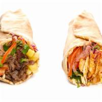 Lamb Gyro · Lamb cooked on a spit and wrapped in a pita. 