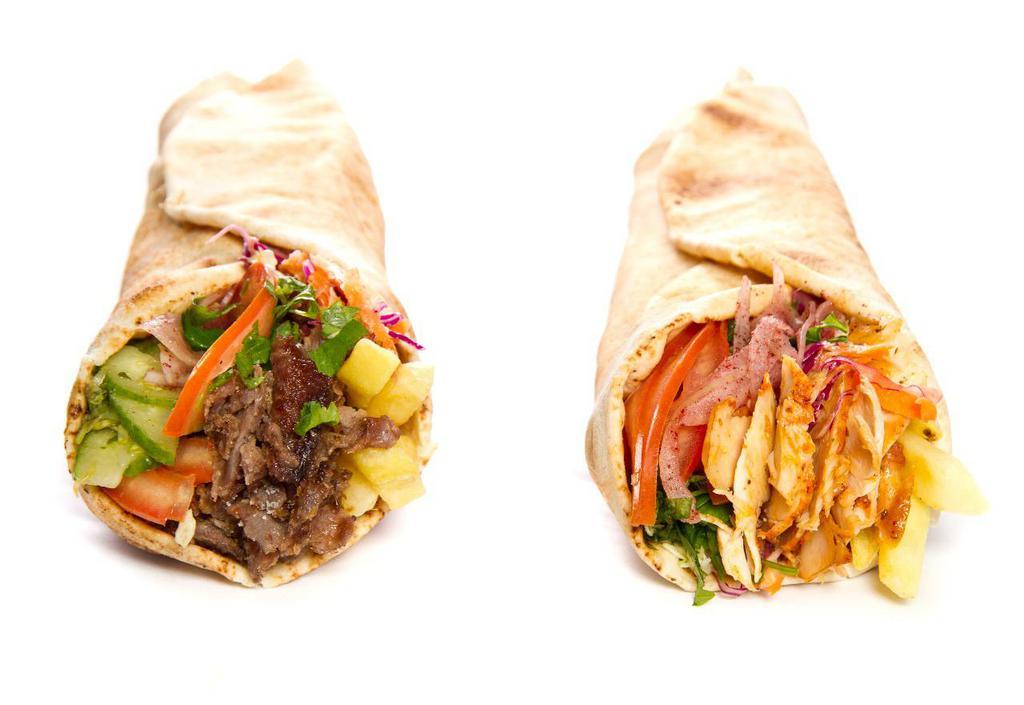 Lamb Gyro · Lamb cooked on a spit and wrapped in a pita. 
