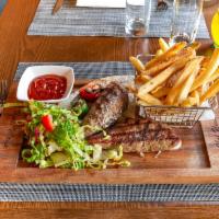 Salt Kofte · Char-grilled minced lamb & beef seasoned with Turkish spices stuffed with Fontana and Kashmi...