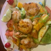 26. Shrimp Salad · Grilled shrimp mixed with green salad, jacama, onion, tomatoes, cucumber, lime juice and min...